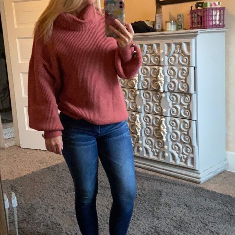 Pink turtleneck
